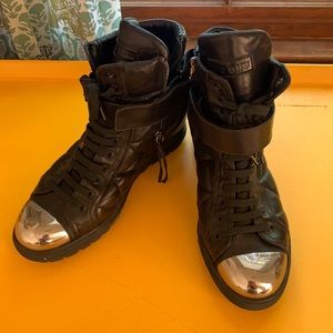 Miu Miu leather high top shoes